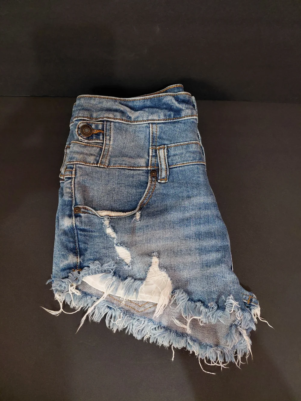 eunina Distressed Light Blue High-Rise Denim Shorts